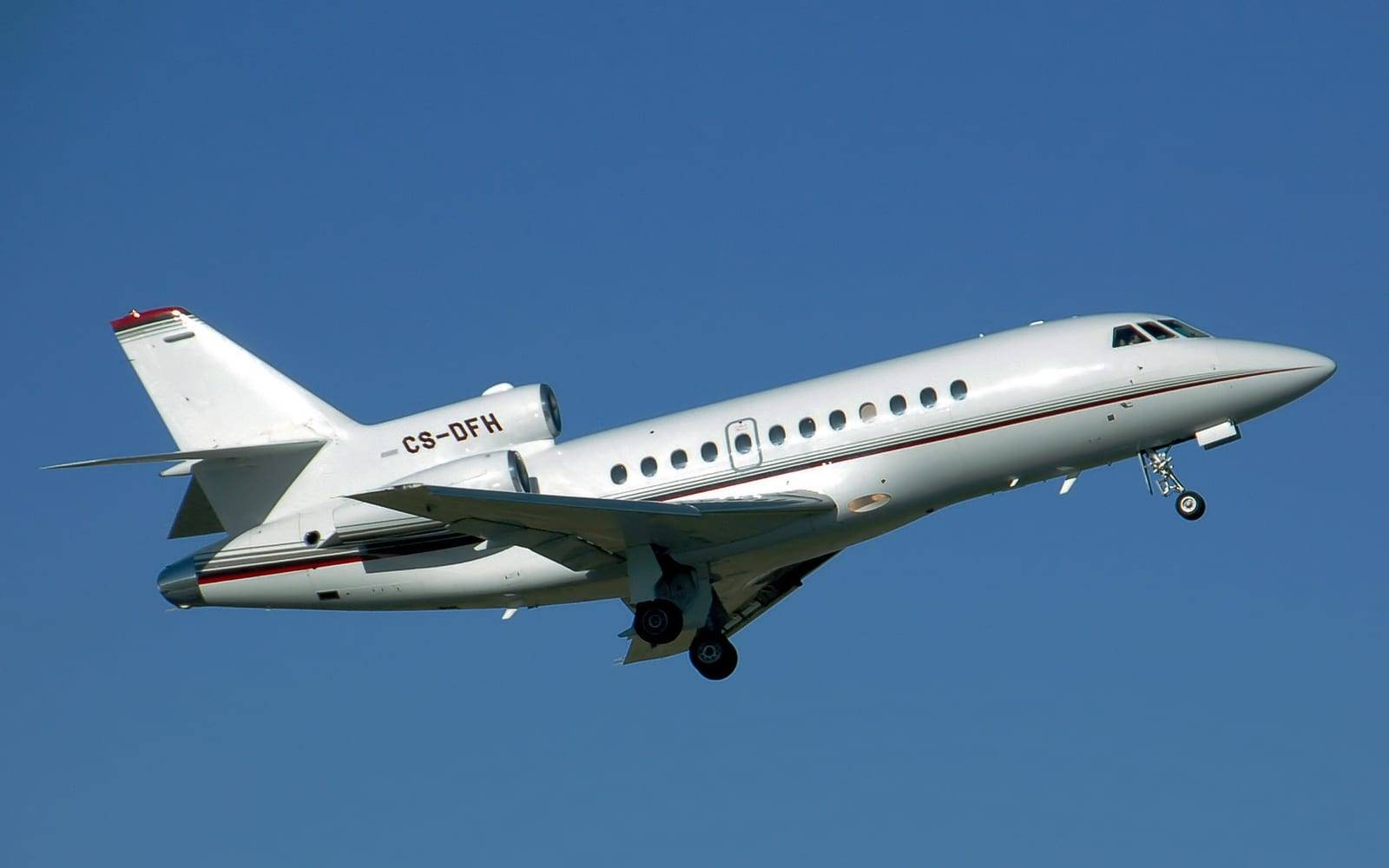 A Dassault Falcon 900 climbing away after take-off