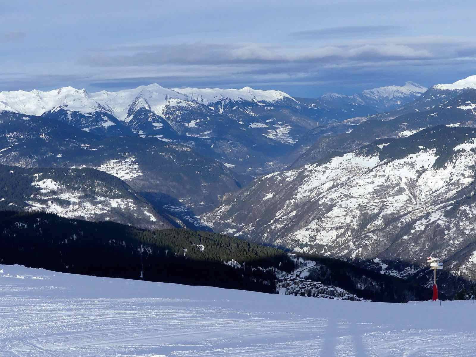 Sight, from the slopes of Courchevel ski resort, of the Tarentaise valley at sunrise, in Savoie, France